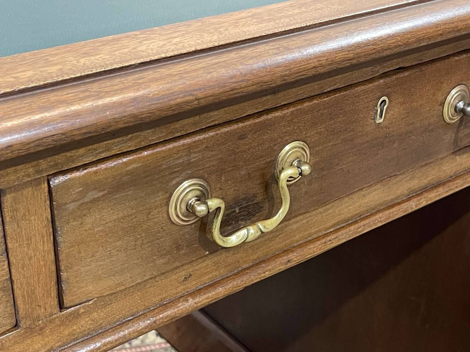 Late 19th century English mahogany desk with pedestals and leather top