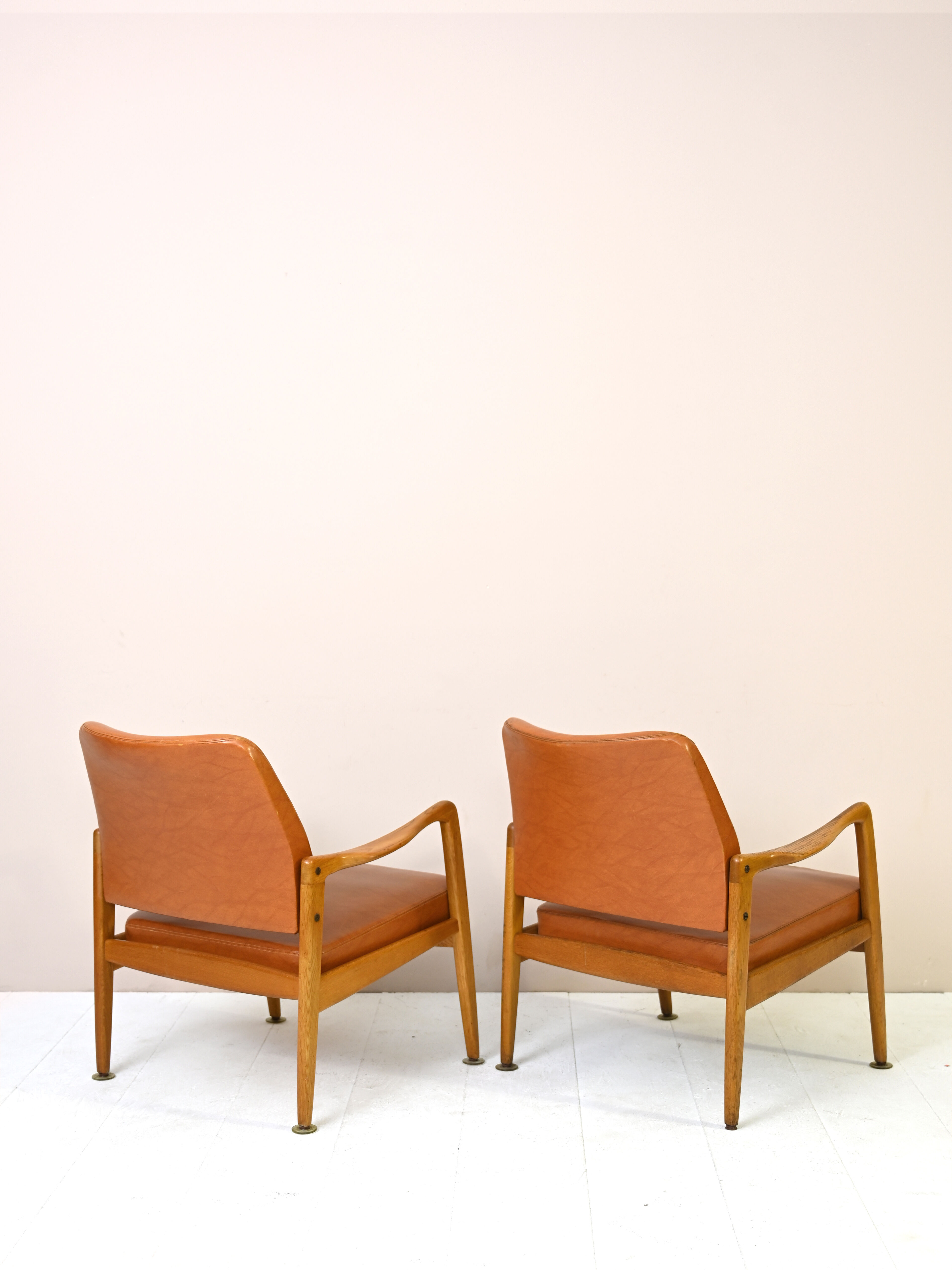 Pair of vintage Danish teak and leather armchairs