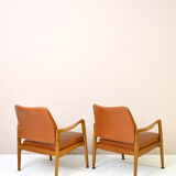 Pair of vintage Danish teak and leather armchairs