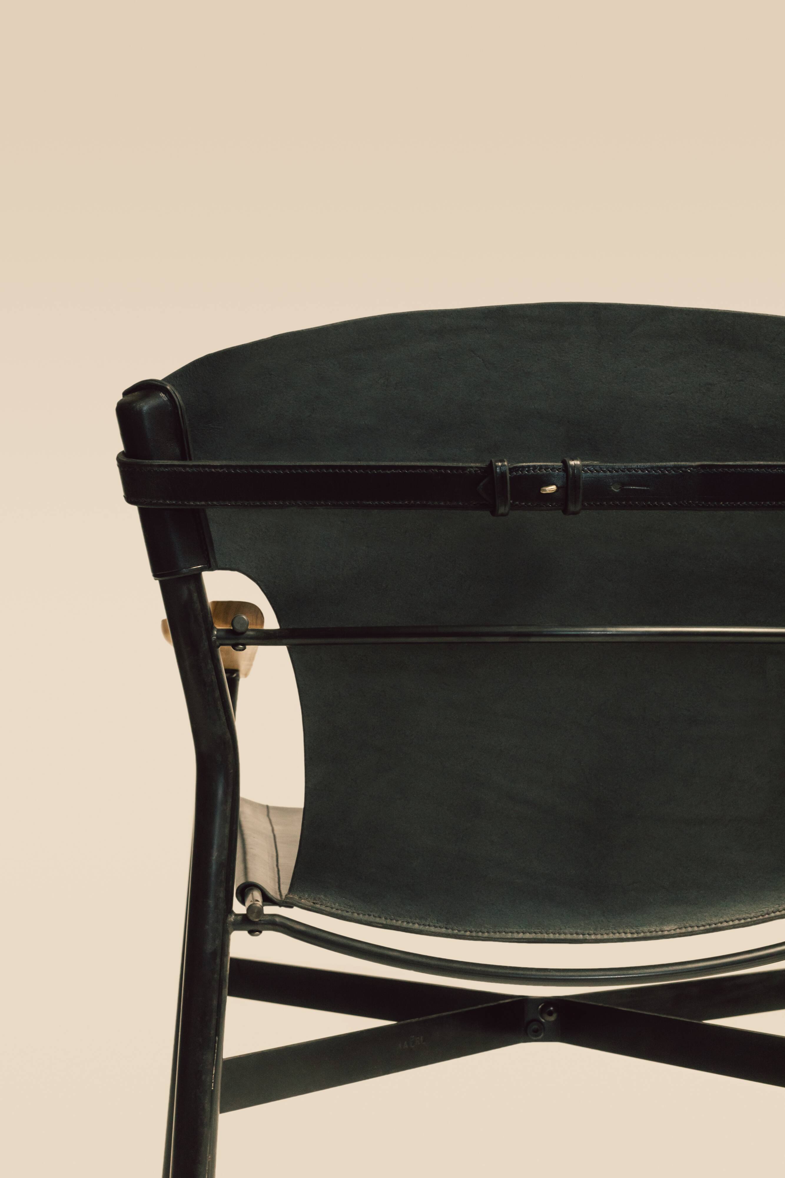 Maërl armchair, Galathée model, black leather, solid wood armrests of your choice