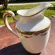 Set of jug, sugar bowl, and milk jug in Limoges porcelain by Paul Past.
