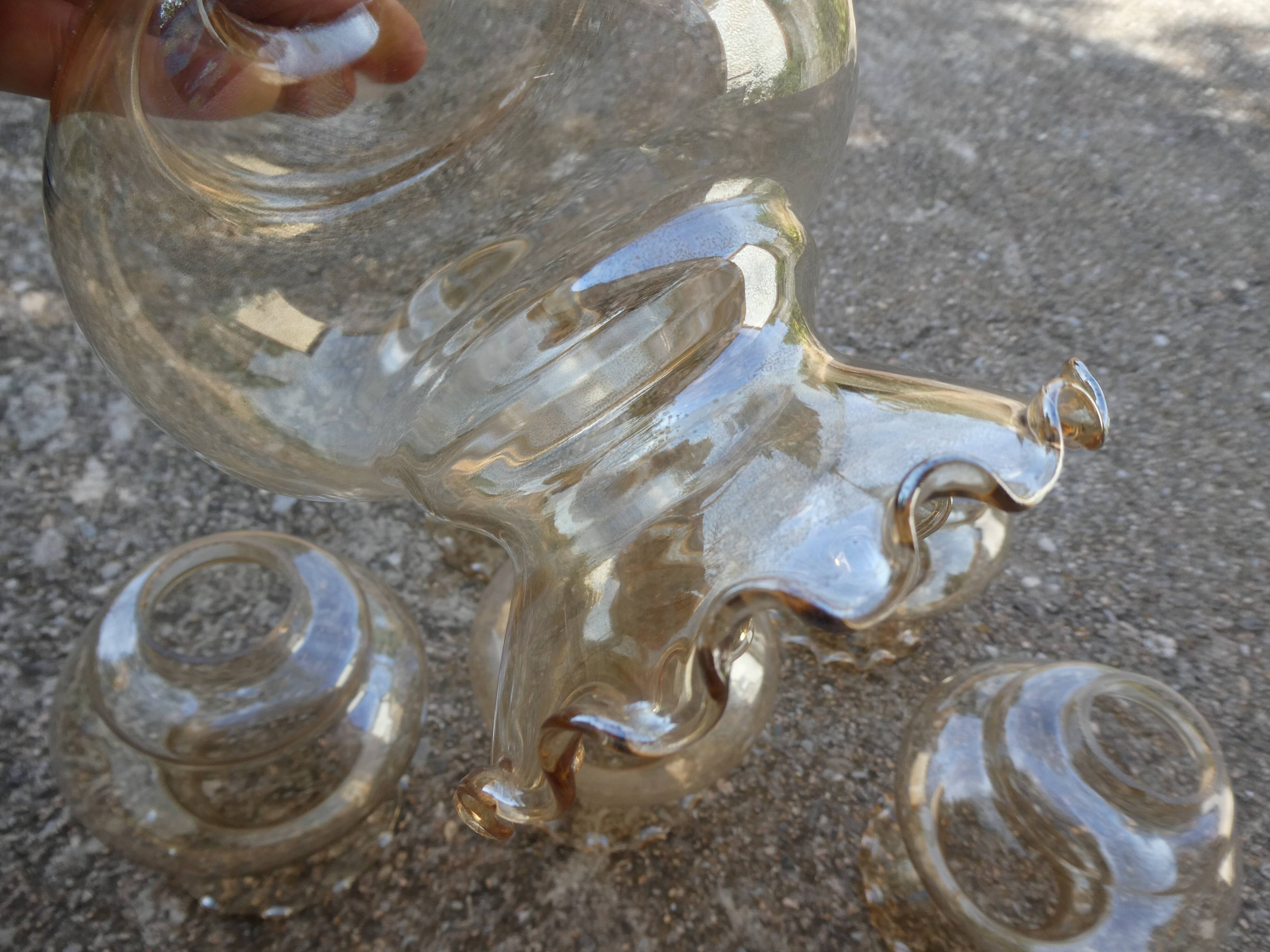 Set of 6 amber glass globes.