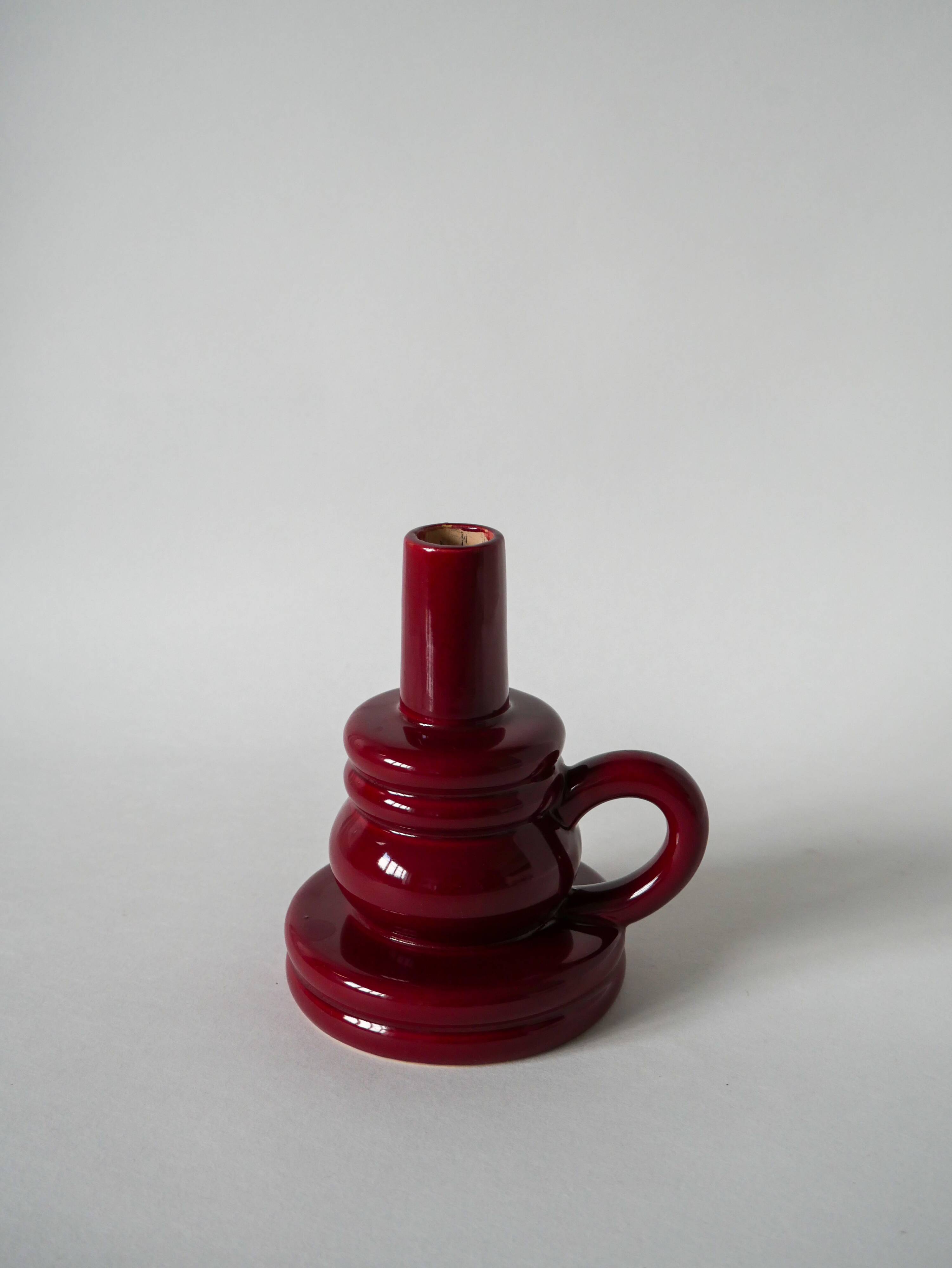 large burgundy ceramic candle holder numbered 1970