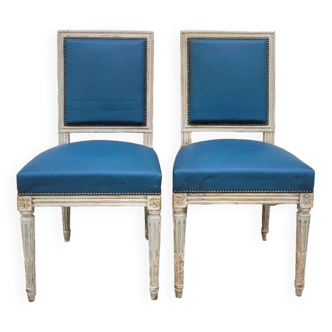 Pair of antique Louis XVI style chairs with patina
