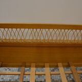 Child's bed in rattan of the years 50