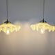 Pair of green opaline glass pendant lights – frosted poetry & Art Deco brilliance