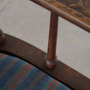 Scandinavian armchair in solid oak with cushion, folk art, early 19th century.