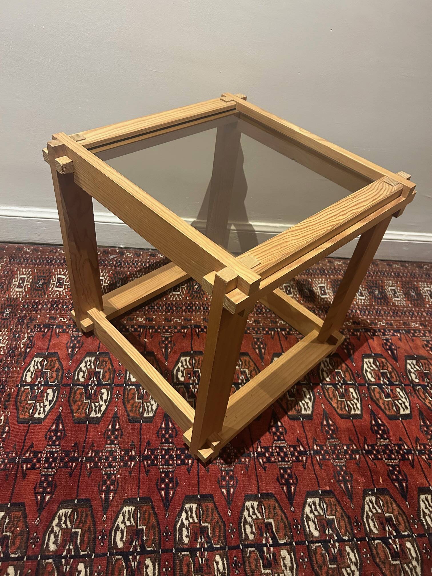 Brutalist table in wood and smoked glass