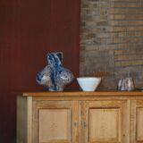 Modern Danish low enfilade in oak with panelled doors, mid-20th century.