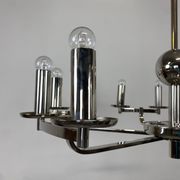 Large Bauhaus chandelier with two wall sconces.