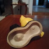 Yellow canary figurine and its candle holder
