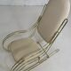 60s rocking chair in brass and ecru faux leather
