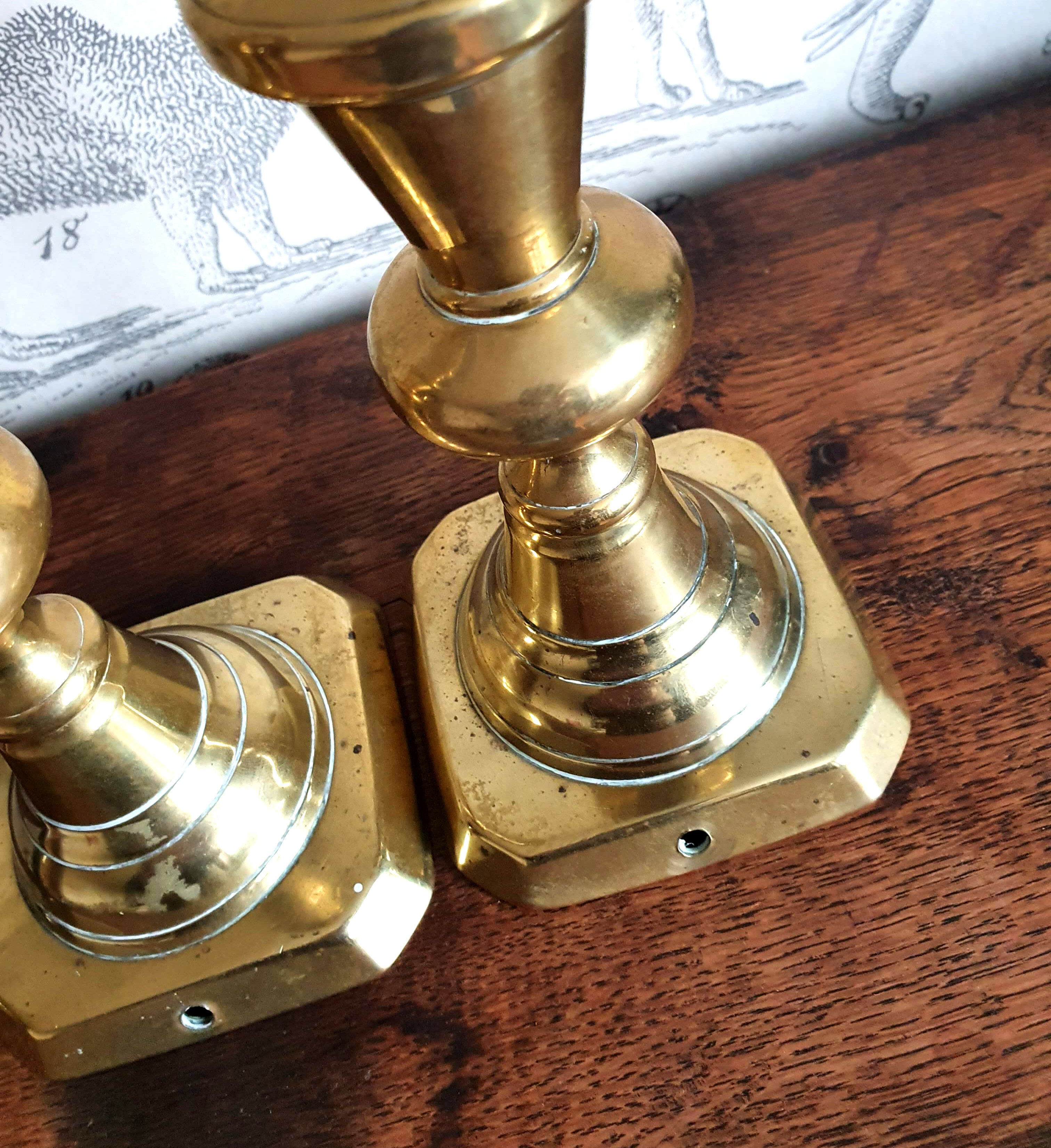 Duo of brass candle holders