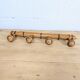 Turned wooden coat rack