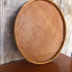 Old vintage braided wicker sieve