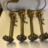 Supports curtain rods and ambers