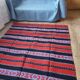 Traditional rustic red wool rug with stylized design and stripes, authentic hand-woven 160x230cm