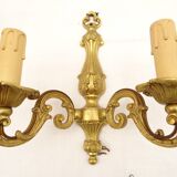 Pair of sconces in gilded bronze double candles