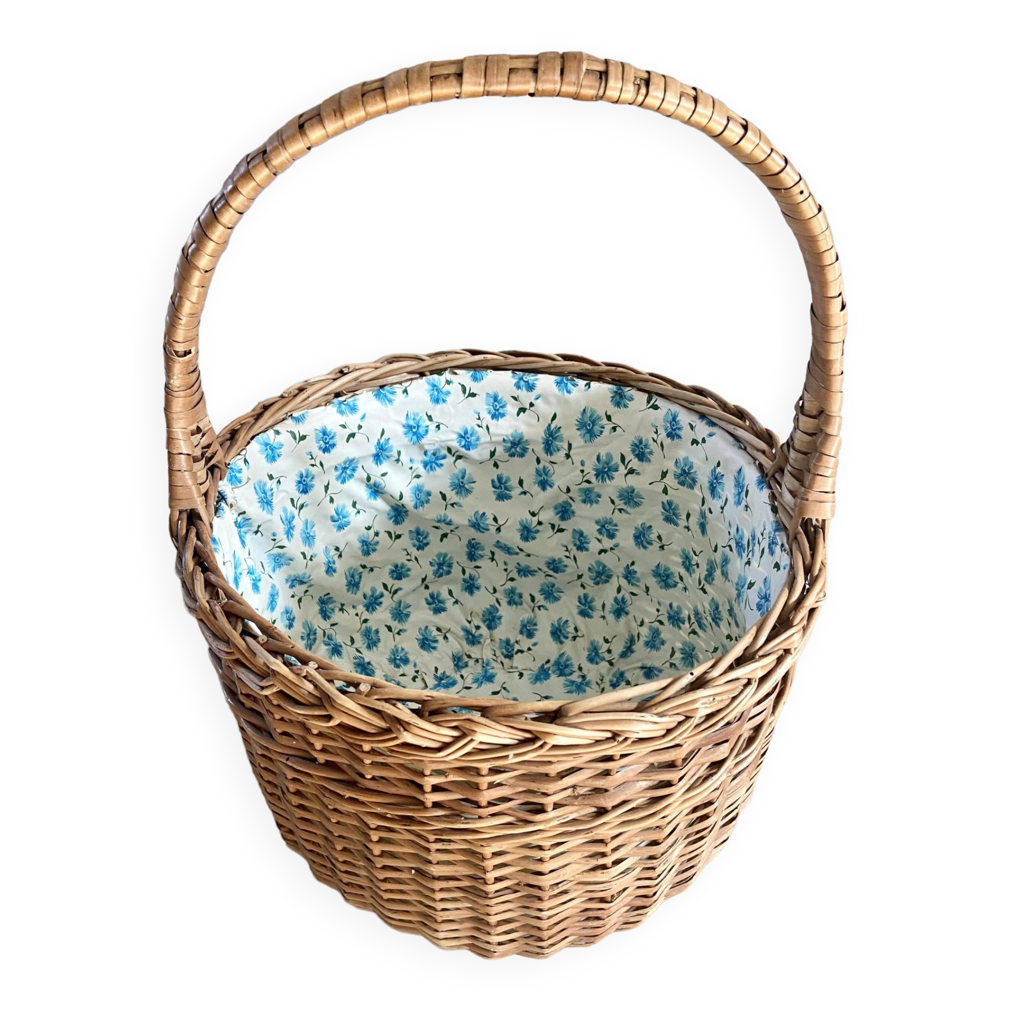 Wicker basket with waxed canvas blue flowers