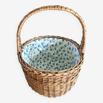 Wicker basket with waxed canvas blue flowers