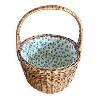 Wicker basket with waxed canvas blue flowers