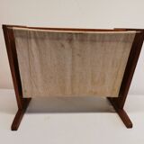 Magazine rack in teak wood with sand-coloured canvas, Danish and from the 1970s.