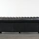 Set consisting of a cowhide leather Chesterfield sofa and matching ottoman