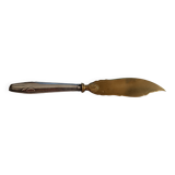 Serving shovel in filled and gilded silver.
