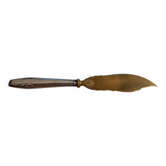 Serving shovel in filled and gilded silver.