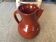 Glazed terracotta pitcher