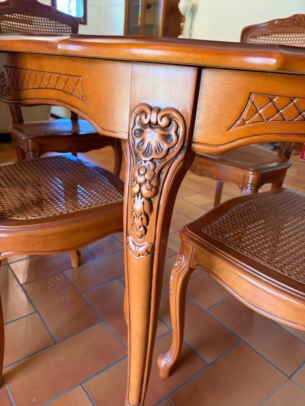 Oval table in Louis XV style and chairs