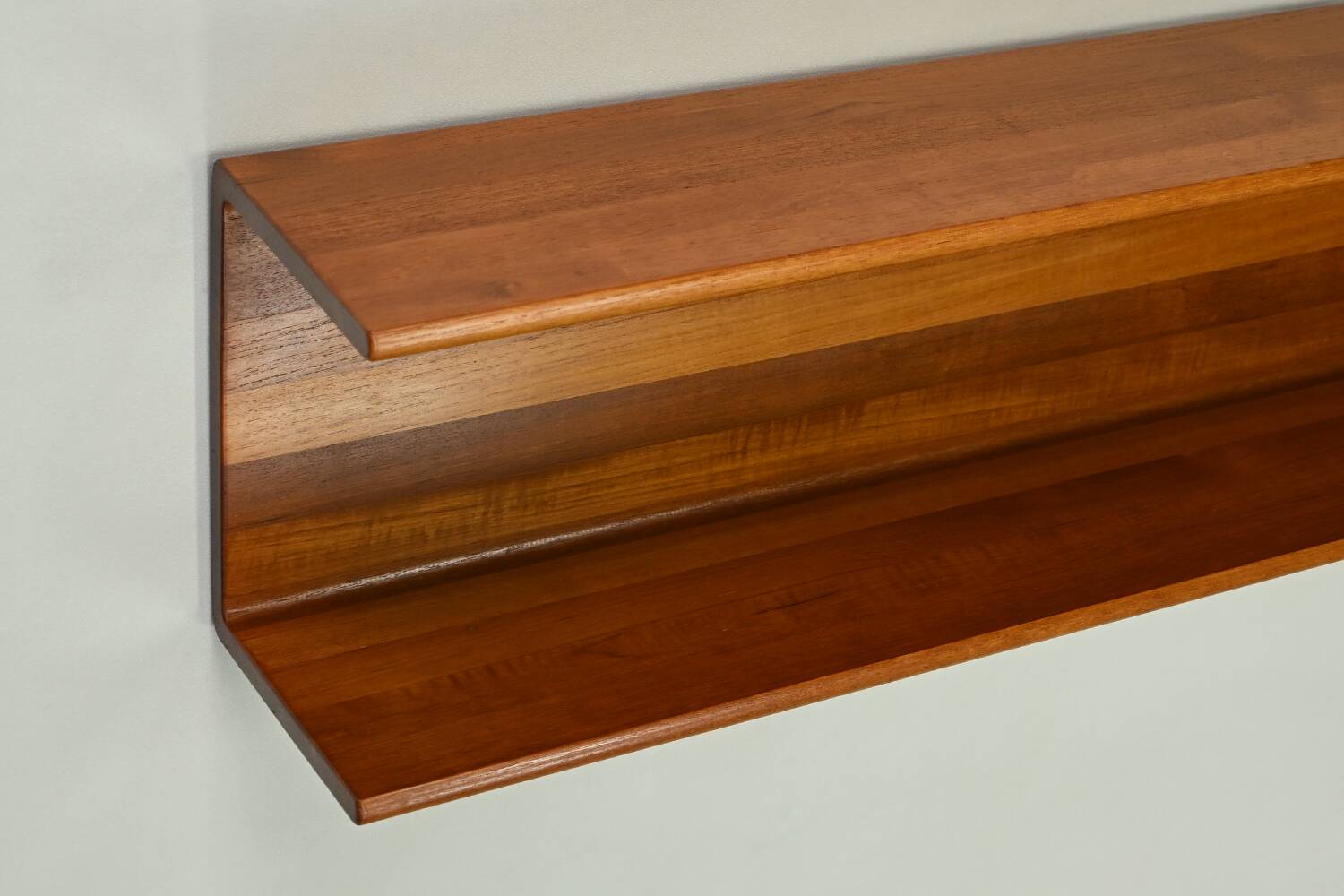 Solid teak wall shelf, 1960s Germany.