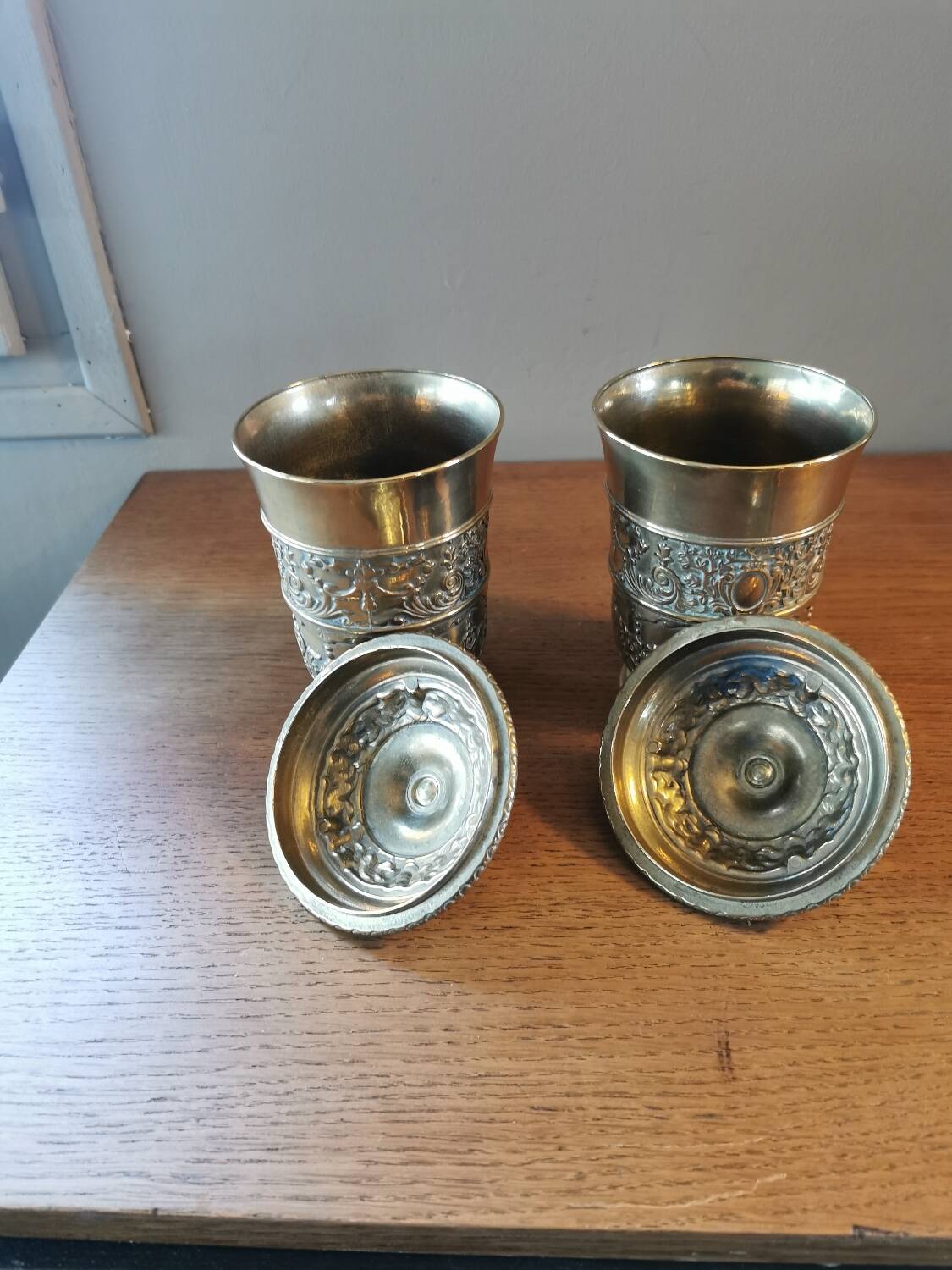 Pair of antique chiseled metal candy boxes