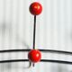 Wall coat rack with 6 colored wooden balls