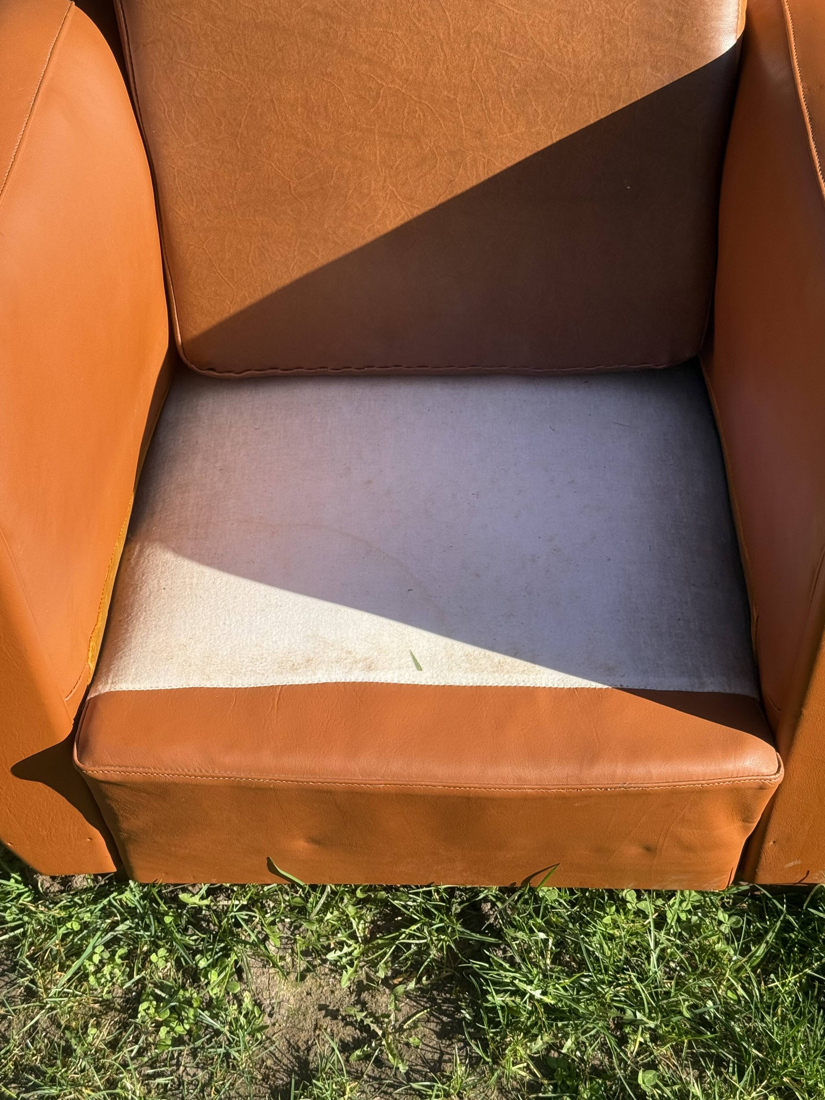 pair of leather clubs