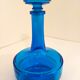 Bottle of old perfume of blue color