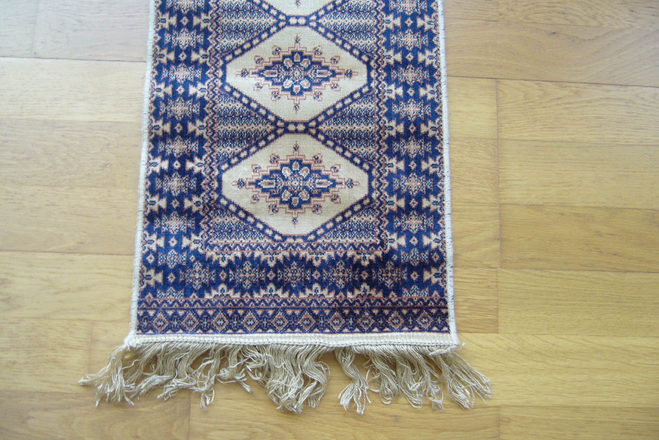 Three oriental rugs 35 x 70 cm