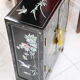 Small storage cabinet or bedside table lacquered black incised and painted