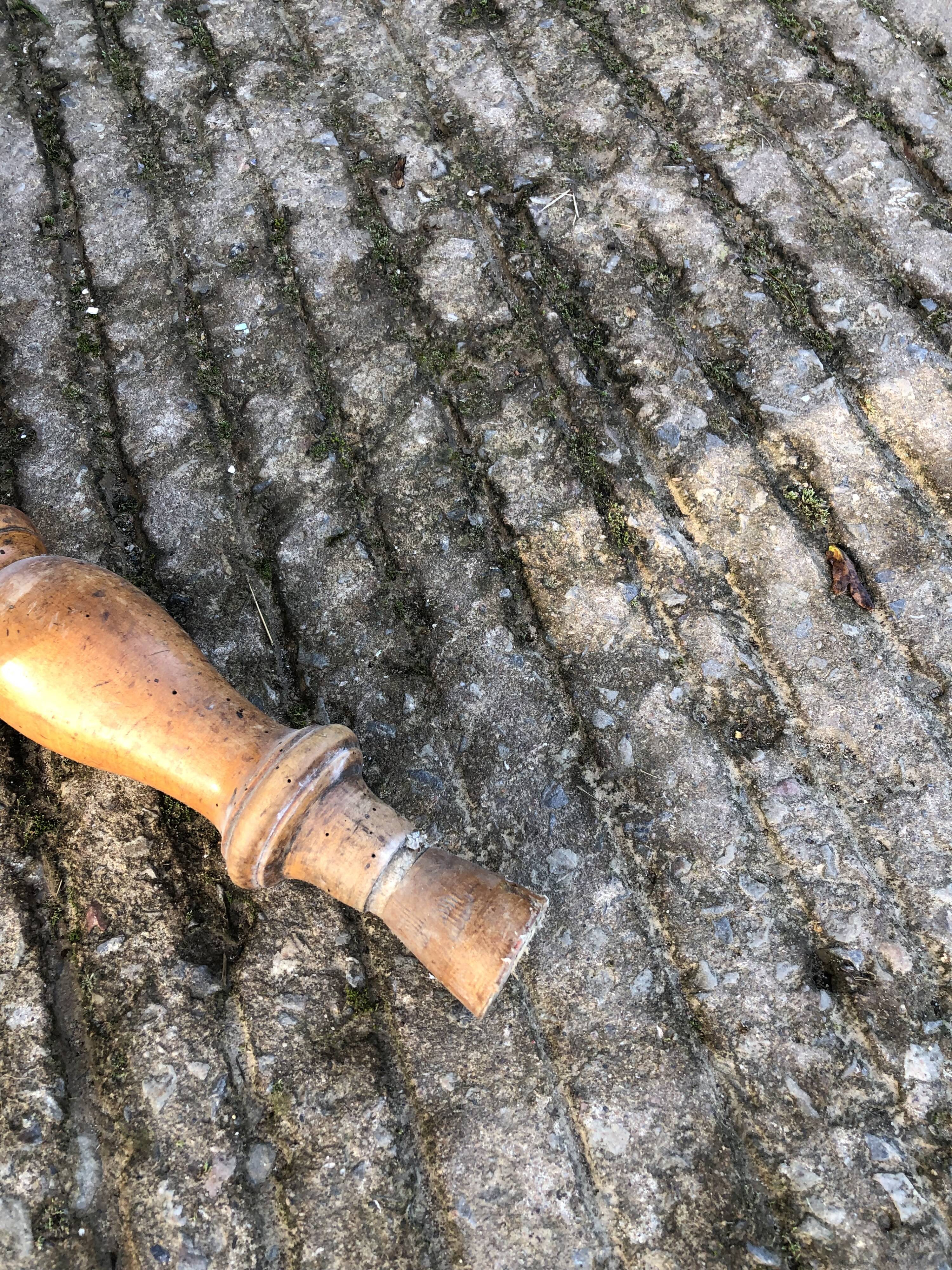 Antique farmhouse table in solid cherry wood with turned legs.