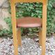 Pair of chairs by Swiss designer Bruno Rey in wood and brown skai