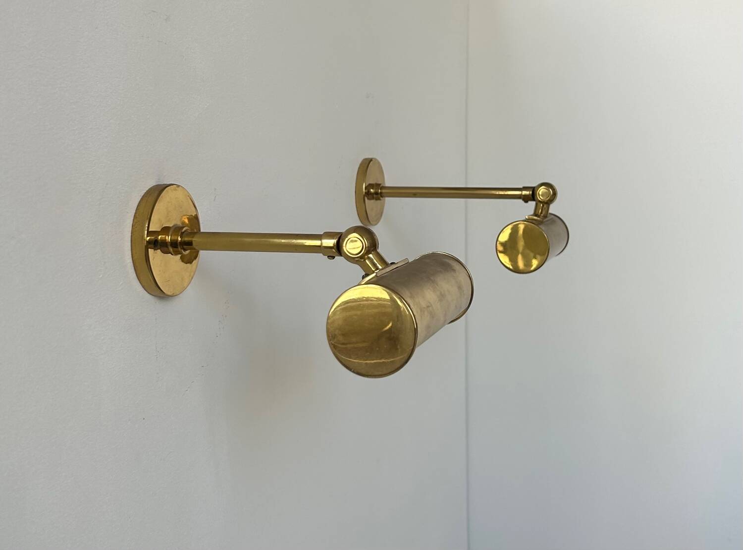 Pair of vintage adjustable wall lights, solid brass, France 1950