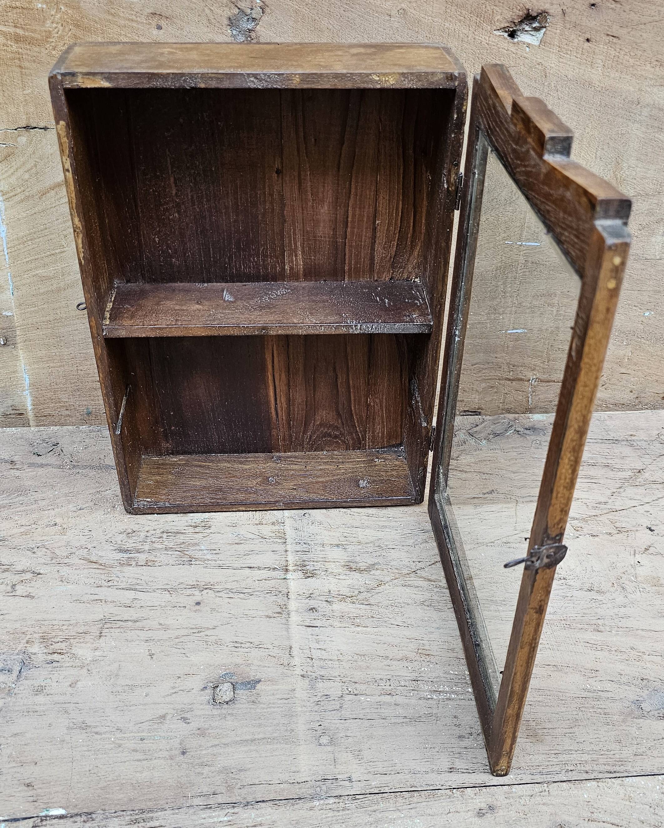 Old Art Deco wall display case in Burmese teak