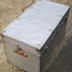 Riveted metal transport trunk