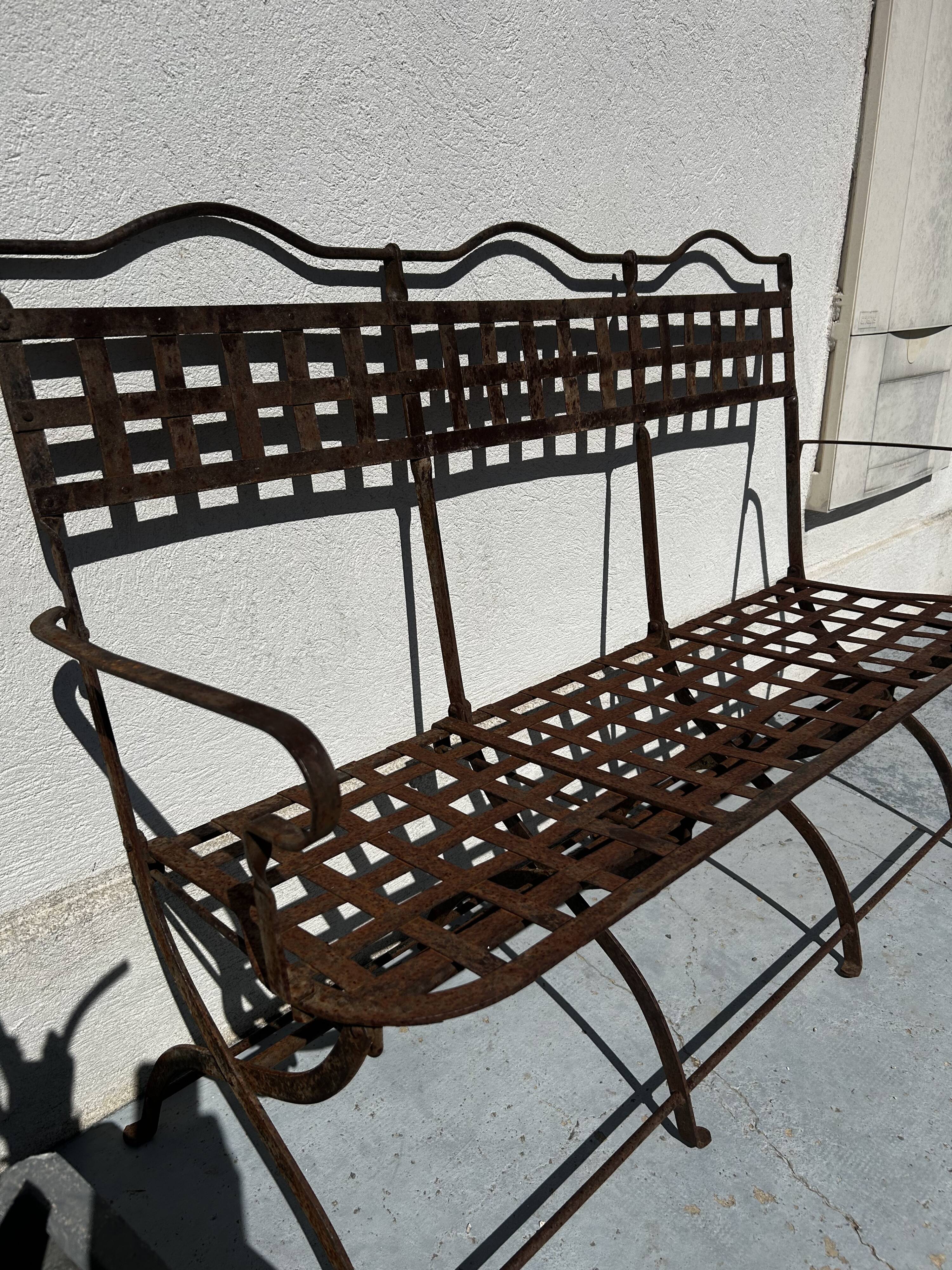 Riveted wrought iron garden bench