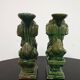 Pair of Foo Dog candle holders in ceramic, China 19th century