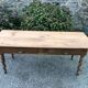 Antique Louis Philippe style farm table in solid cherry wood with 2 drawers and turned base.
