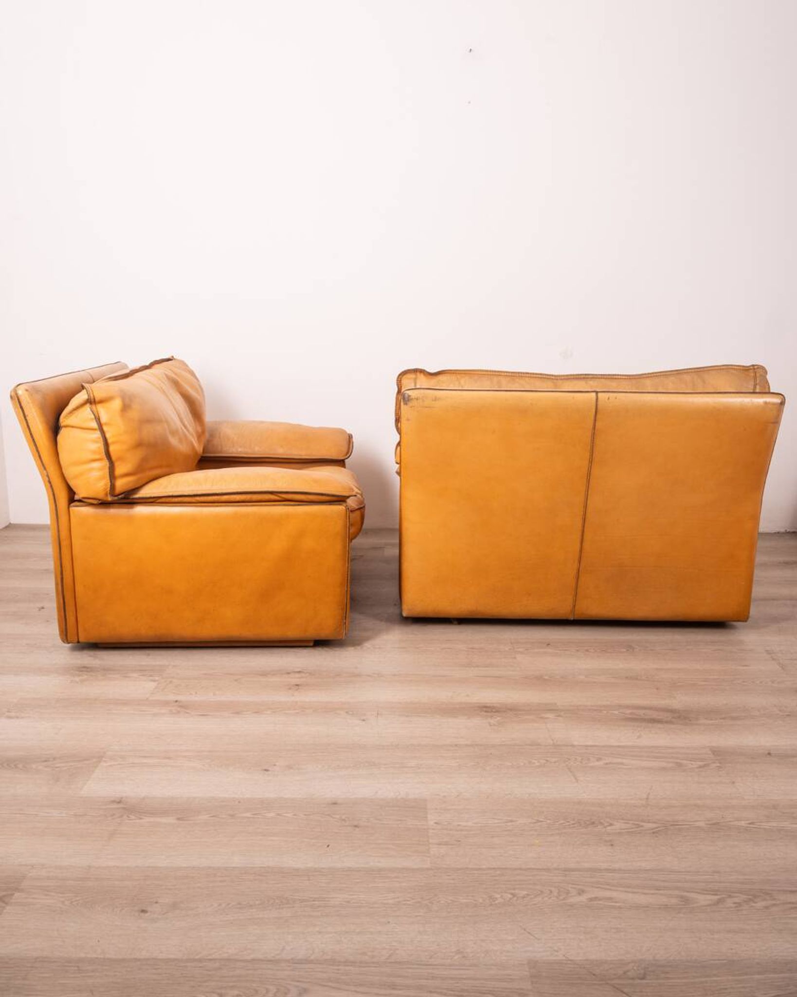 Pair of vintage 70's armchairs in beige leather design ferruccio brunati