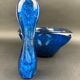 Mortar and pestle in the style of Biot, hard blue.