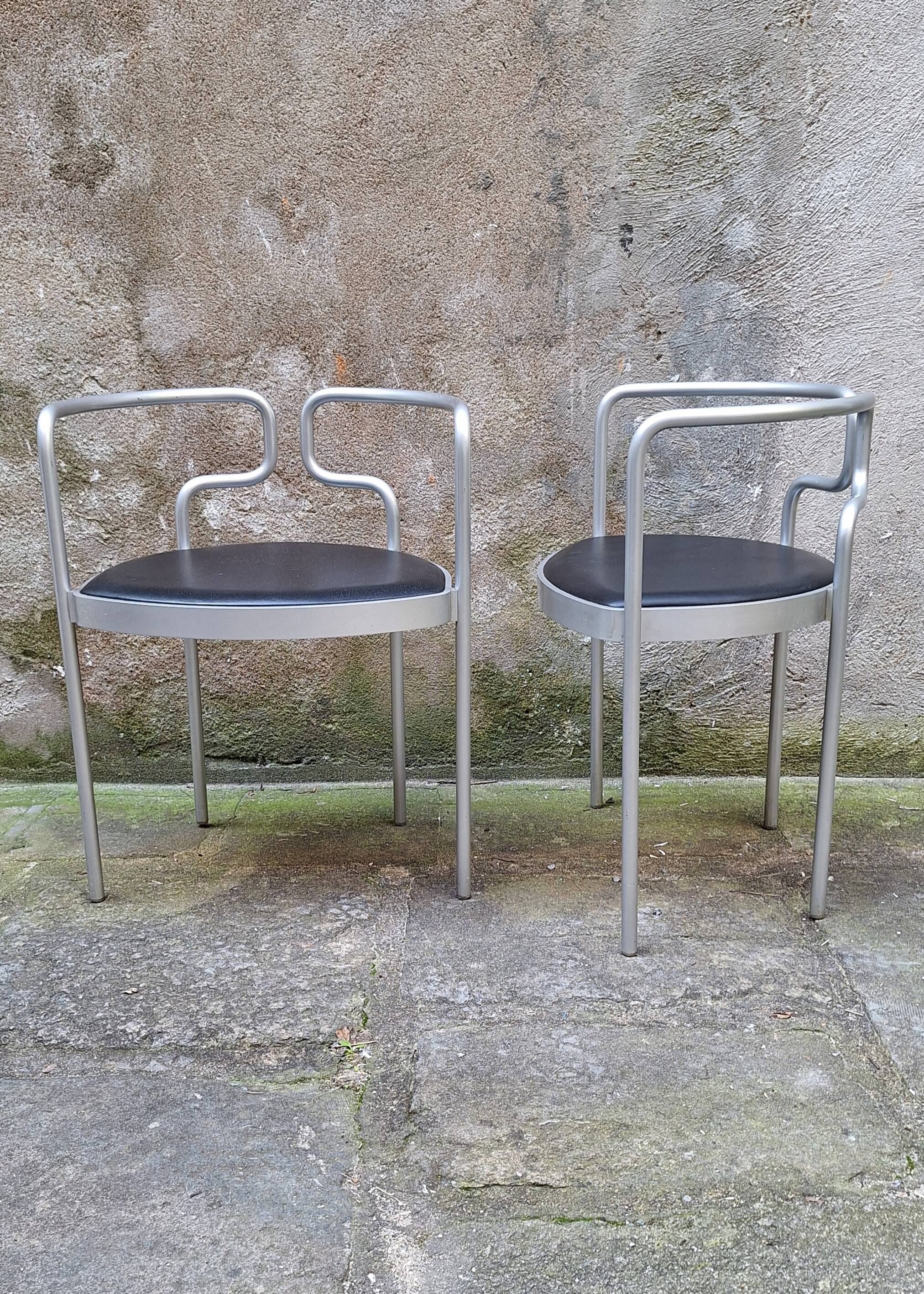 Pair of aluminum armchairs by Henning Larsen