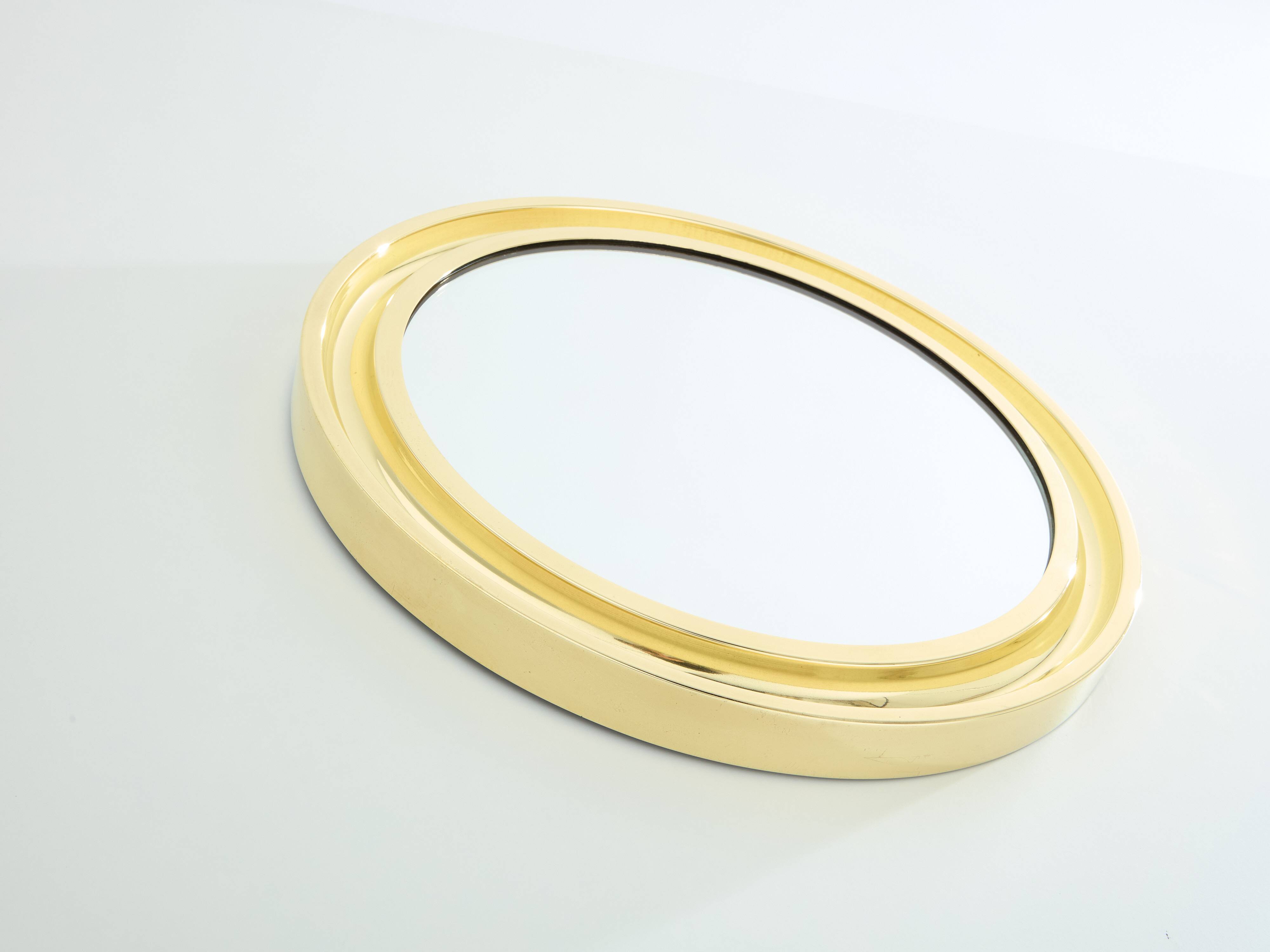 Round brass mirror by Sergio Mazza for Artemide 1960s